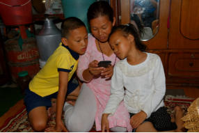 Sundar's Family Looking at Photos of Him