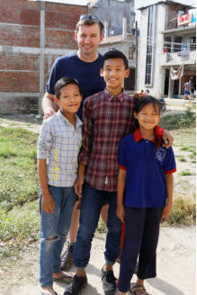 Sundar with his brother and sister, James and Ruth