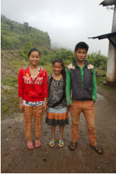 Sandhya (centre) with her brother and his wife